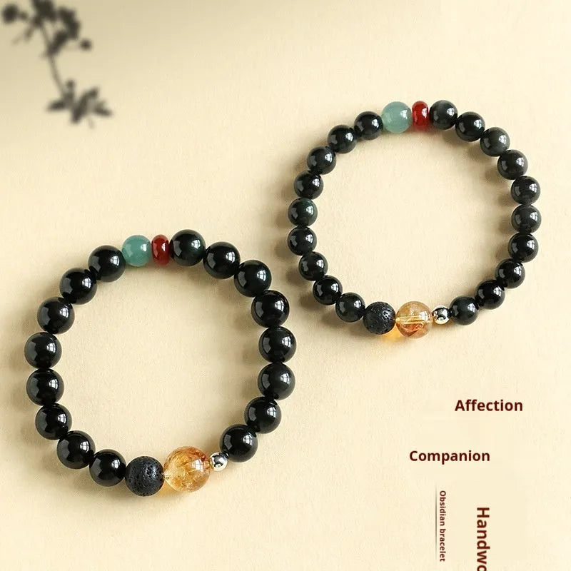 Chinese style obsidian and agate jade couple bracelet with yellow tower crystal beads.