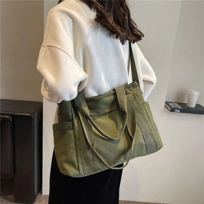 Women's polyester canvas shoulder tote bag with large capacity and internal mobile phone pocket storage