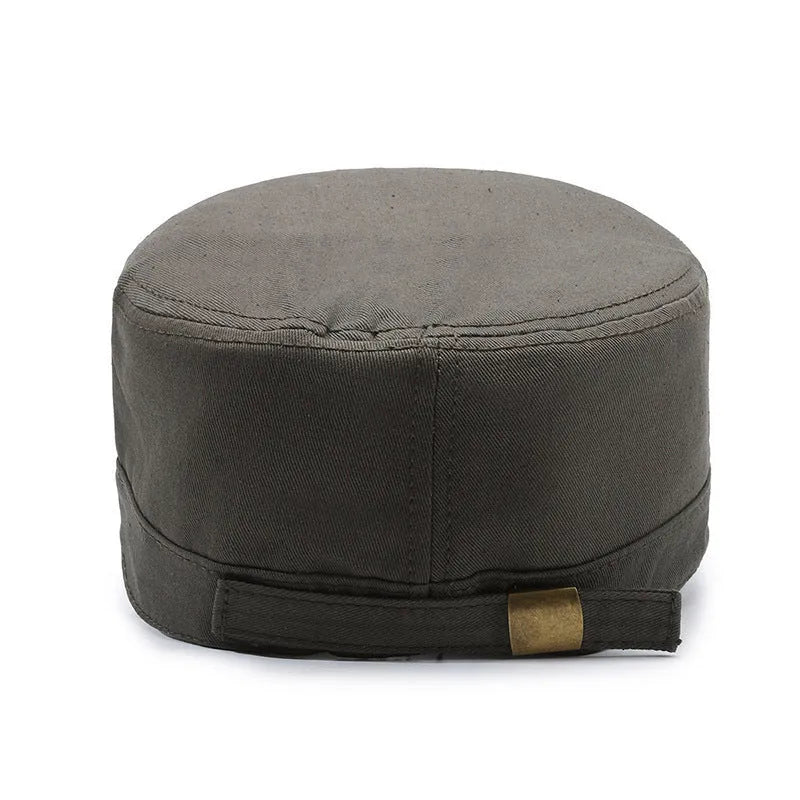 Cotton peaked cap in army green with adjustable strap and English letter detailing.
