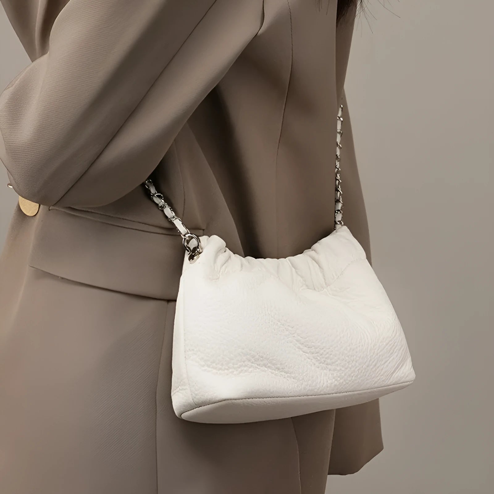Women's genuine leather dumpling-shaped crossbody bag in black with single shoulder strap