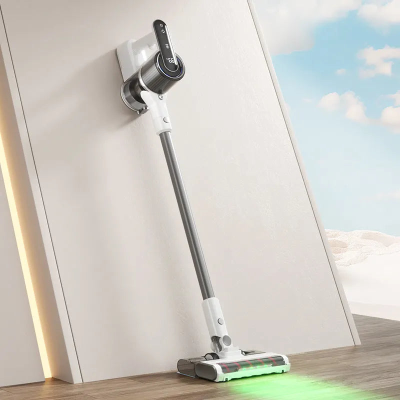 Light gray household wireless handheld folding tube vacuum cleaner with lighting function on a flat surface