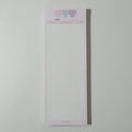Vertical format English vocabulary notepad in B5 half size showing pink cover and double-sided printed pages