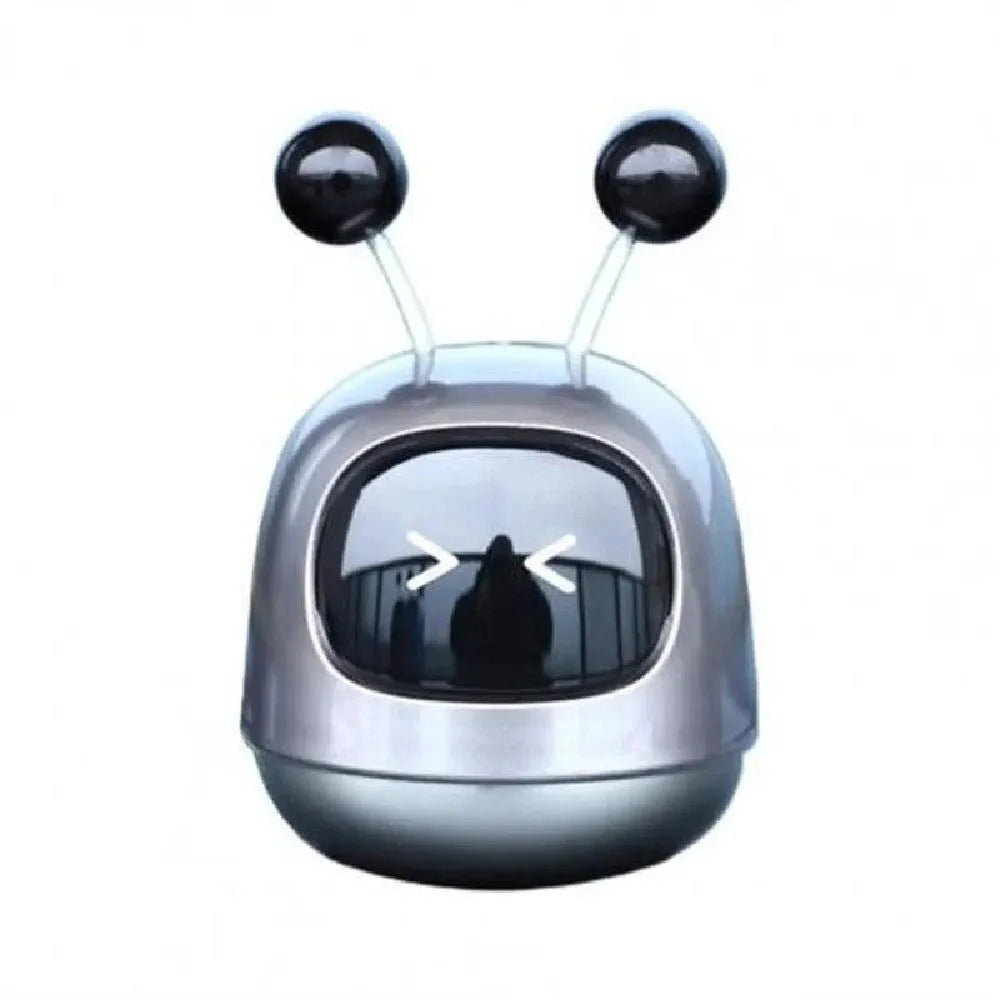 Robot-shaped car vent air freshener ornament in blue, grey or red with gel fragrance.