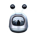 Robot-shaped car vent air freshener ornament in blue, grey or red with gel fragrance.