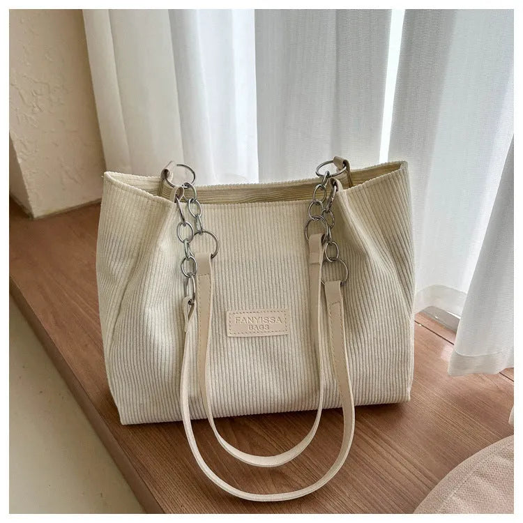 Corduroy women's tote bag with one shoulder strap and three-dimensional pocket