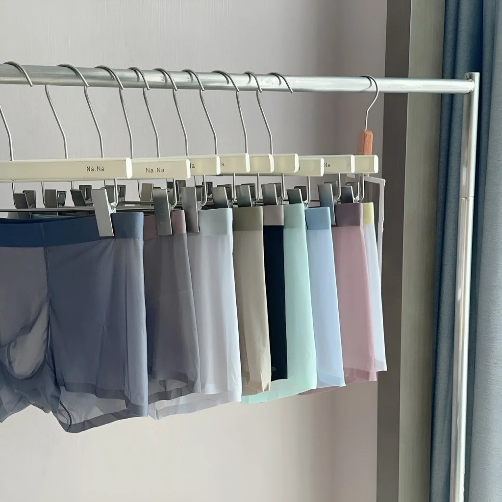 Ultra-thin seamless men's ice silk boxers with a honeycomb crotch panel, shown in multiple colours.