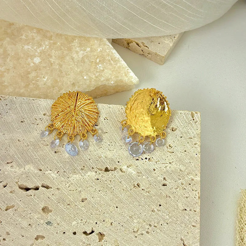 Gold geometric women's earrings with round elements in electroplated metal
