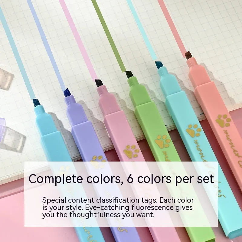 Cat's Paw set of six fluorescent marking pens with oblique heads in assorted colours.