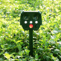 Green solar-powered ultrasonic dog and pest repeller with weatherproof ABS housing