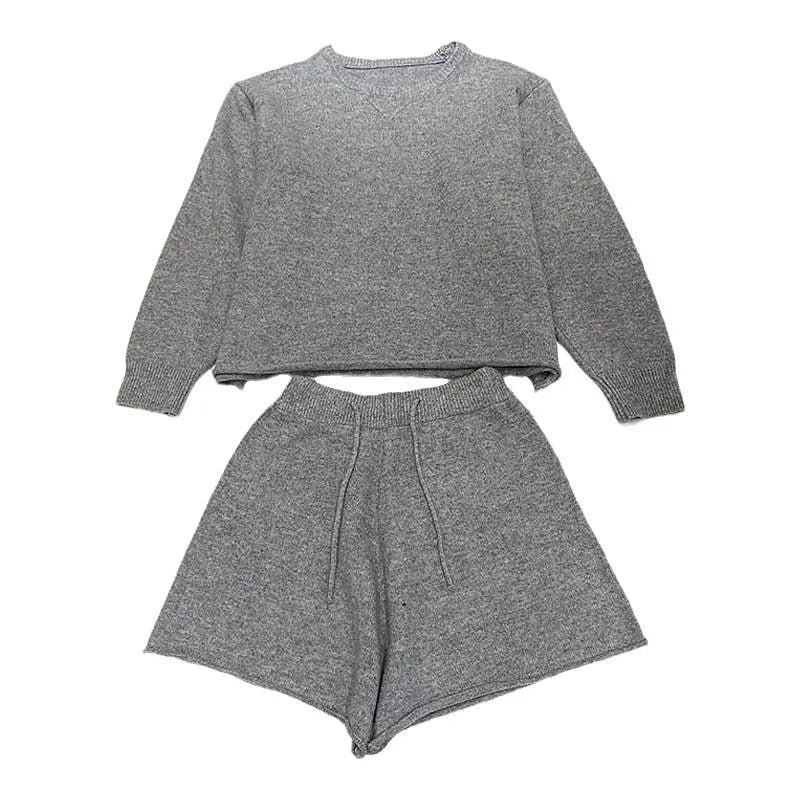 Women's loose-fit long sleeve sweater and knitted wide-leg shorts two-piece set in oatmeal colour.