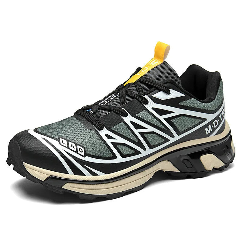 Low-top lace-up hiking shoe in khaki with a rubber sole and mesh lining detail.