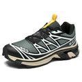 Low-top lace-up hiking shoe in khaki with a rubber sole and mesh lining detail.