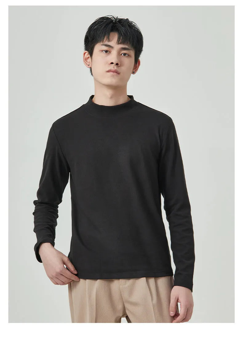 Men's solid colour half-high collar long sleeve t-shirt in Dralon fabric on a hanger.