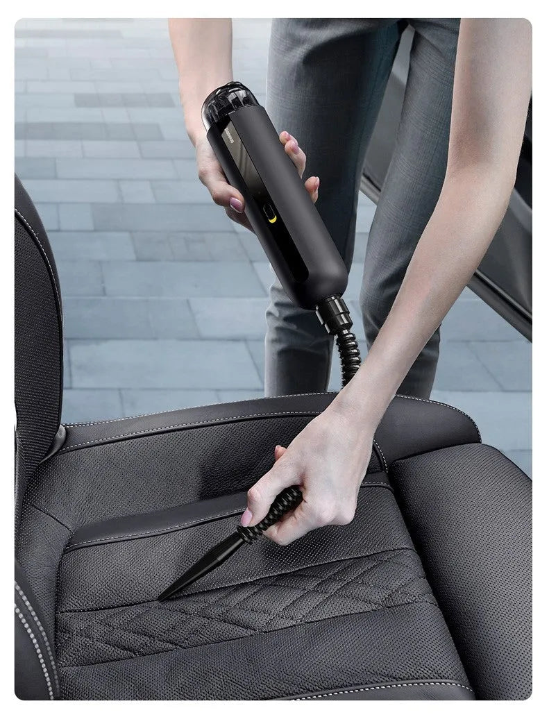 Baseus handheld cordless car vacuum cleaner with blowing hose, shown in black next to its 60ml dust cup.