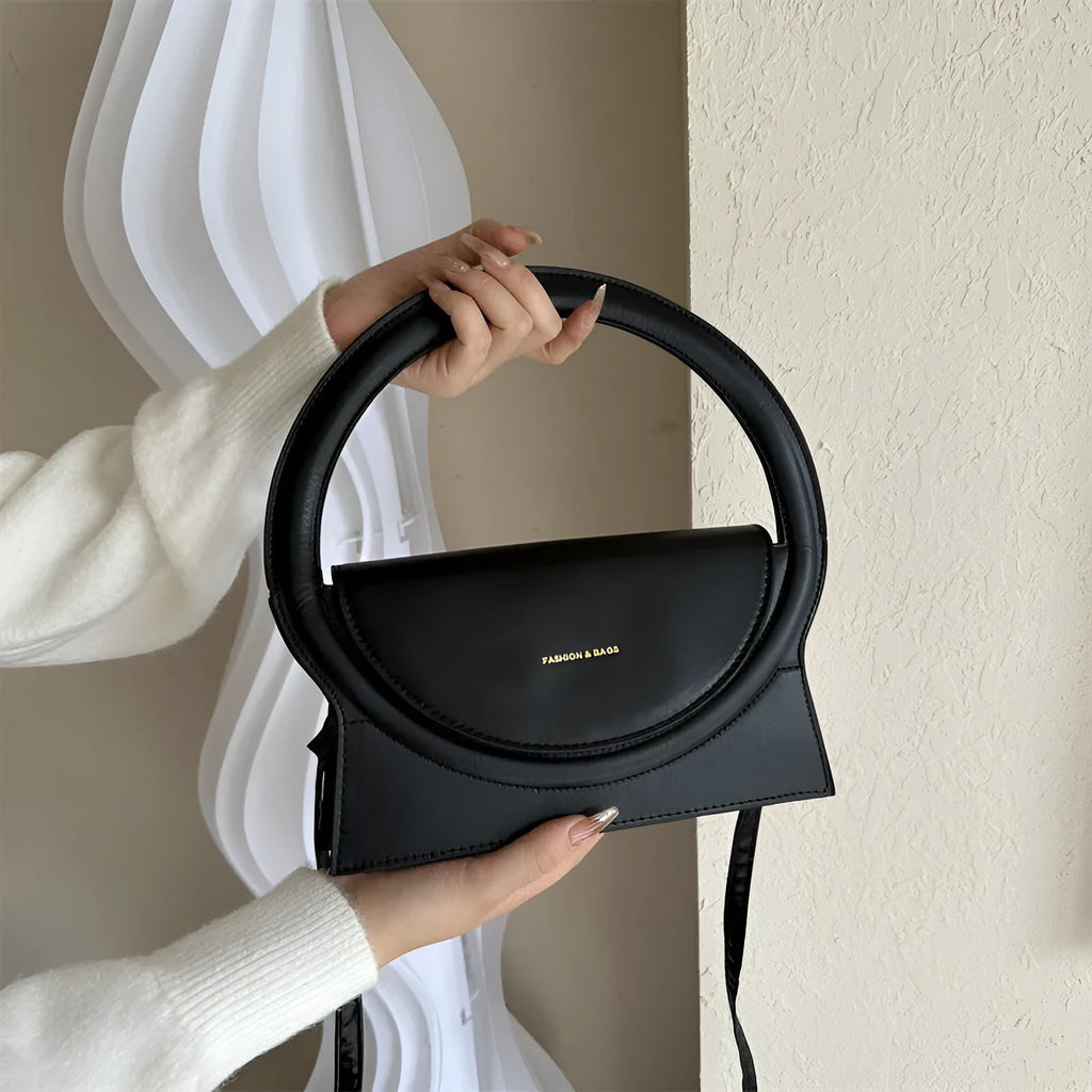 PU leather messenger bag with sandwich pocket design and stitching detail