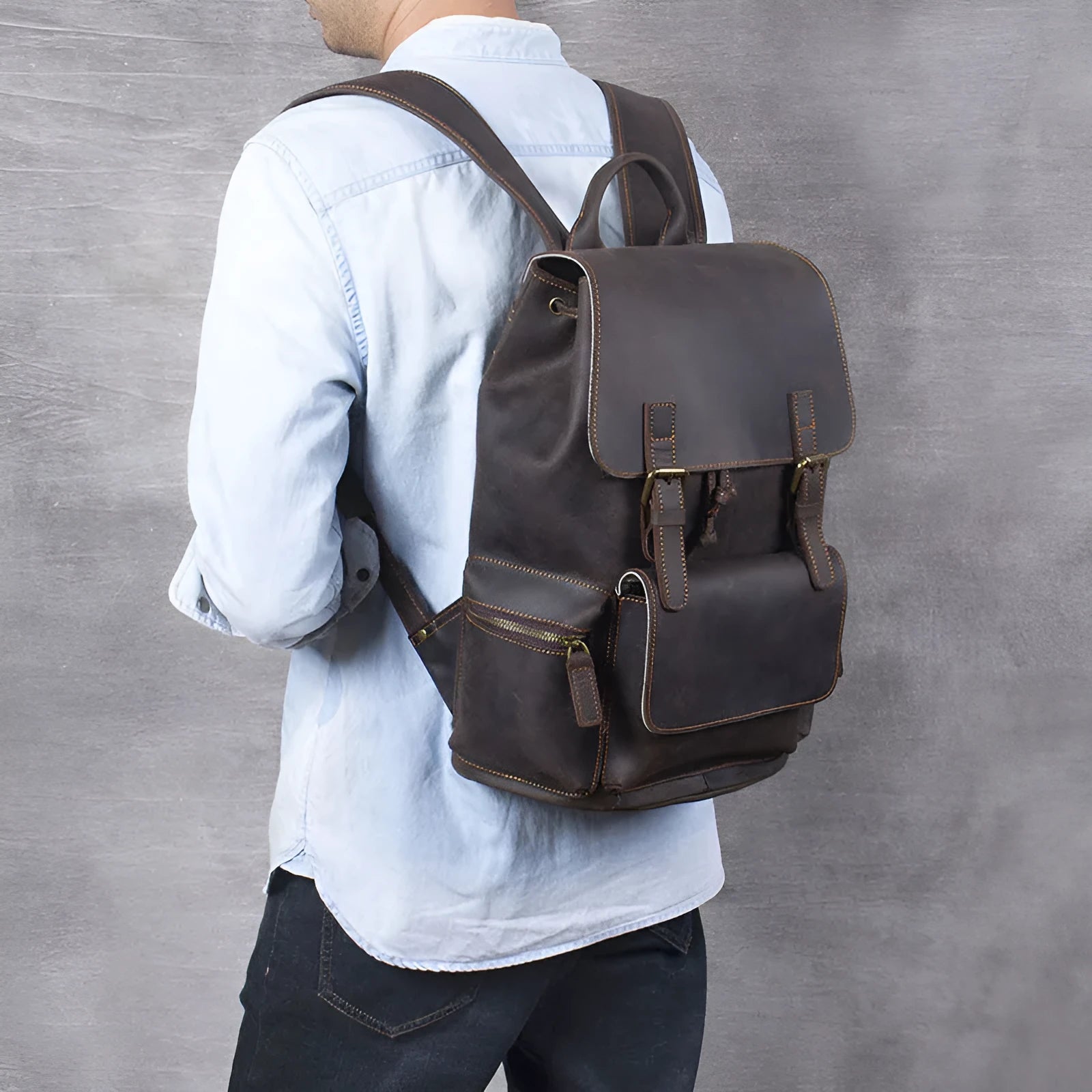 Retro crazy horse leather backpack in brown showing double shoulder straps and soft handle