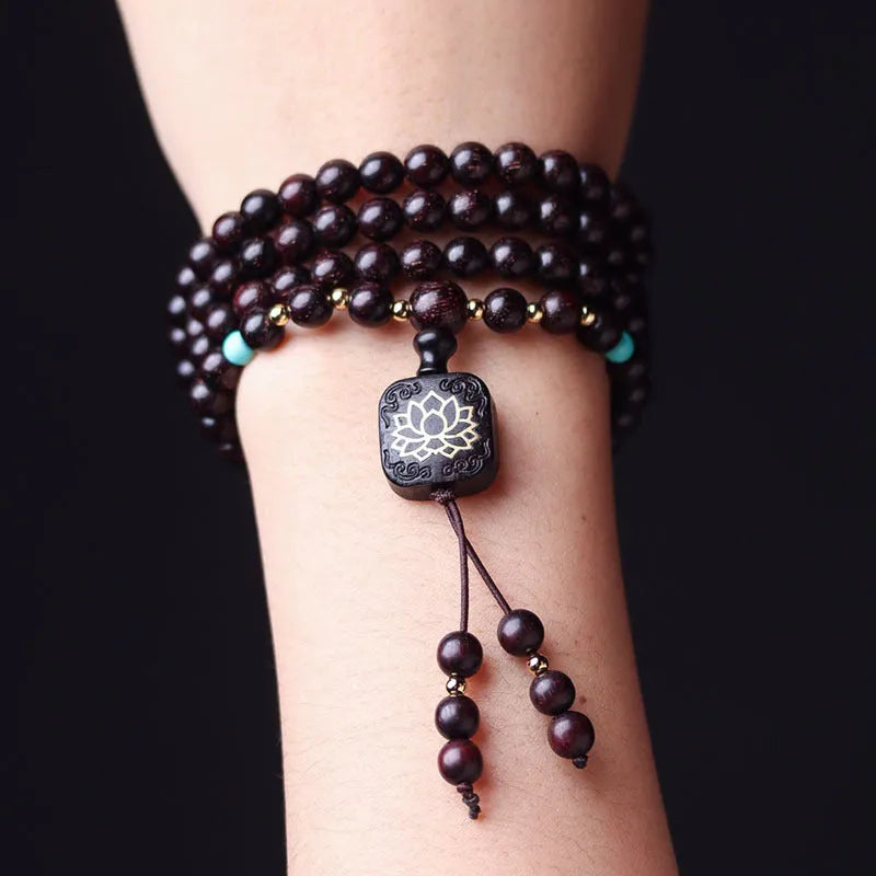 Zambian rosewood bead bracelet with 108 flat lotus pendant beads measuring 0.6 cm each