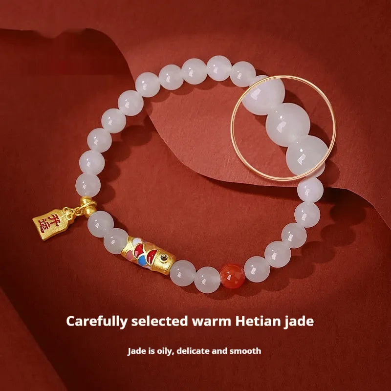 S925 sterling silver bracelet with koi fish design, cold enamel details, and natural Hetian jade.