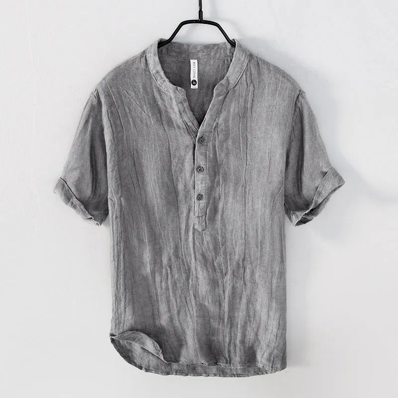 Retro-style linen pullover top in a solid colour with short sleeves, shown on a hanger.