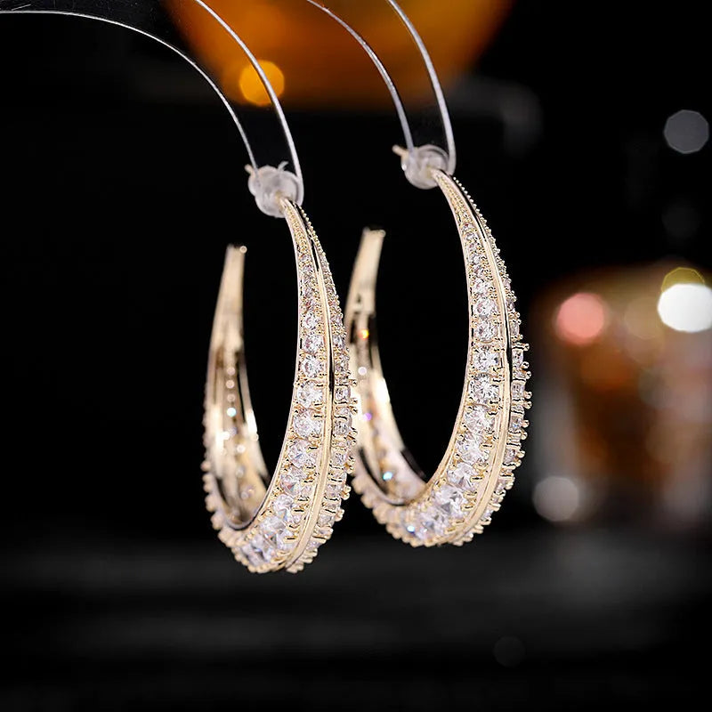 Women's geometric copper hoop earrings with electroplated finish in five colour variations