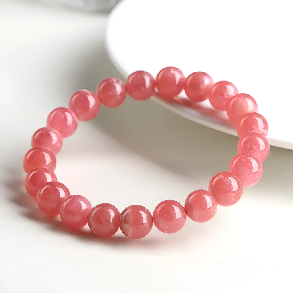Geometric red rhodochrosite crystal bracelet for women with a Longevity Lock clasp.