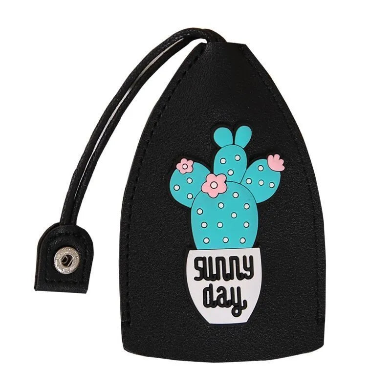 Cartoon pull-out key case in PU leather measuring 14 x 7.5 cm with colourful designs