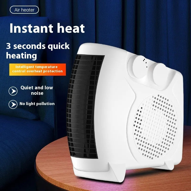 Small white desktop electric heater with power control, shown on a desk for scale