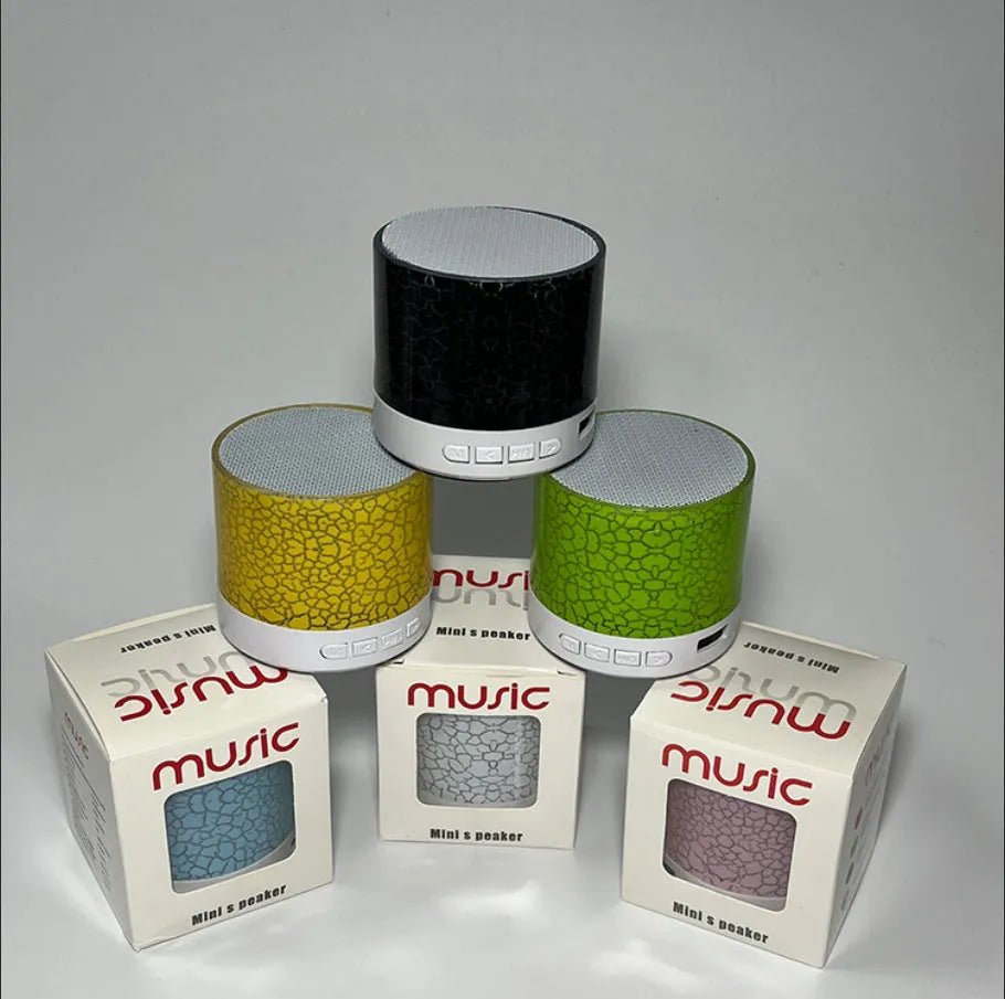A9 Mini Cracked Bluetooth speaker in white with cracked-effect finish and LED lights