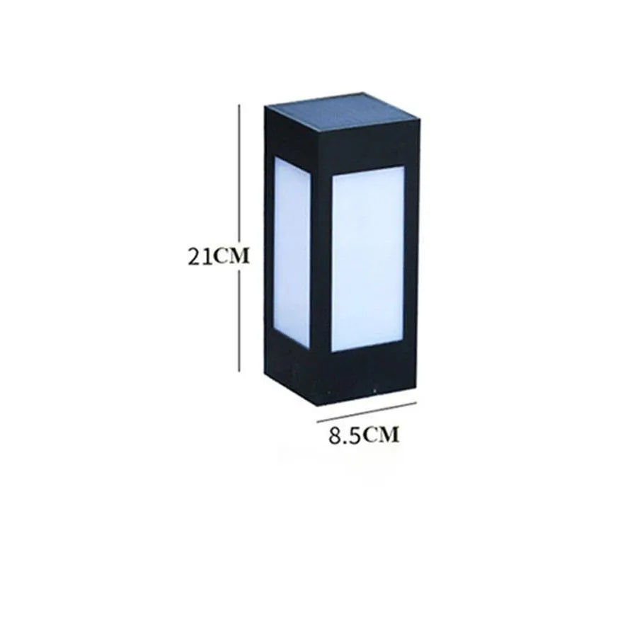 Waterproof solar-powered LED garden light installed on an outdoor wall.
