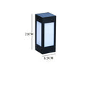 Waterproof solar-powered LED garden light installed on an outdoor wall.