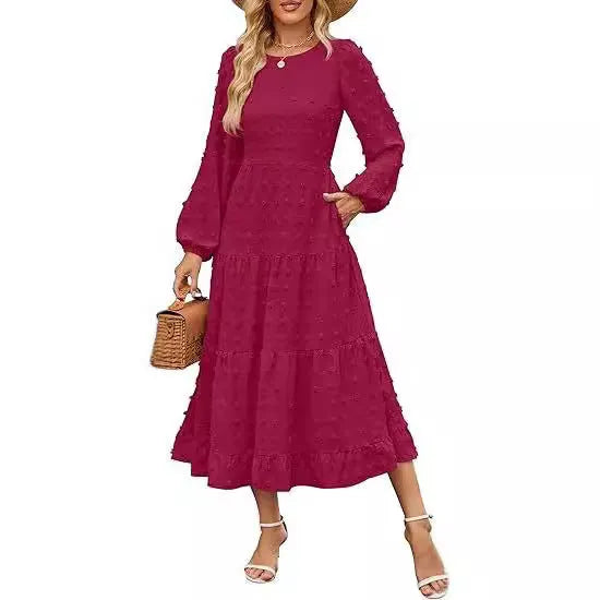Long sleeve casual dress with round neck, high waist, and ruffle sleeves in a solid colour.