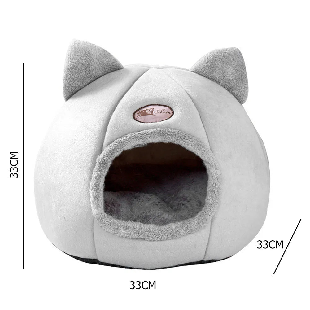 Large grey enclosed sofa-style winter nest cat bed for indoor cats, showing removable fleece lining.