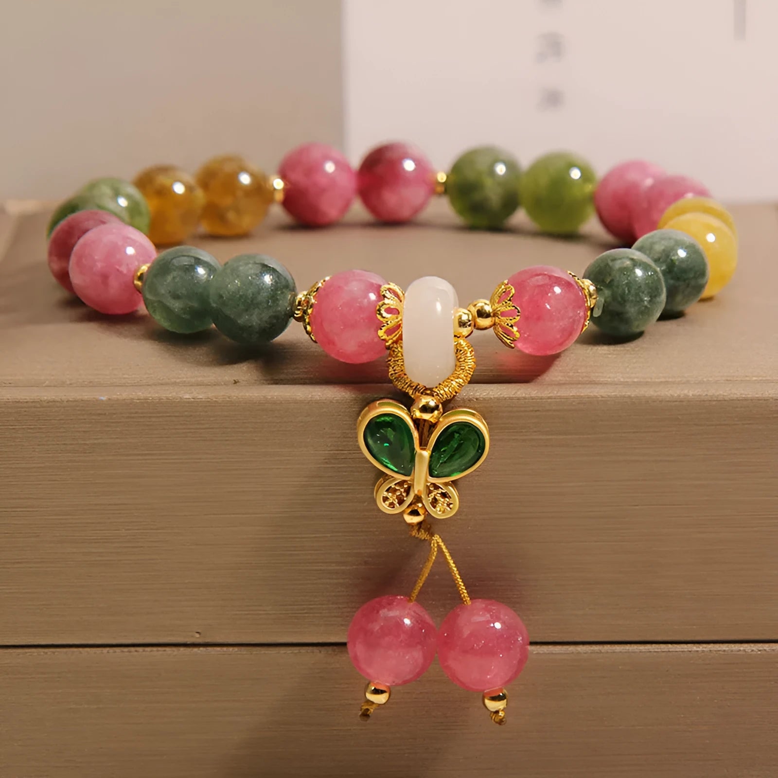 Colourful tourmaline butterfly pendant bracelet with alloy setting and rhinestone accents