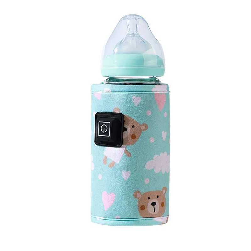USB baby bottle warmer in a blue dinosaur patterned composite velvet insulating cover.