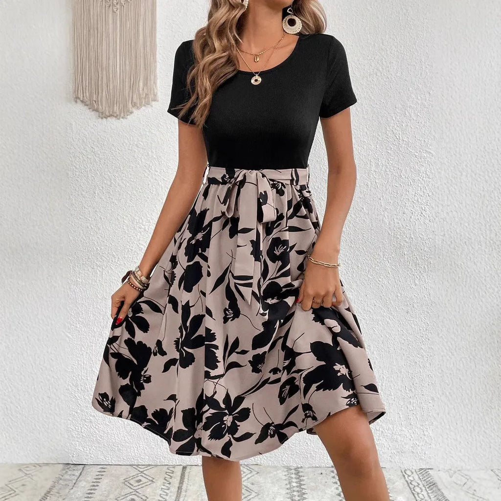 Khaki women's A-line dress with floral print and lace-up detail on the shoulder strap.