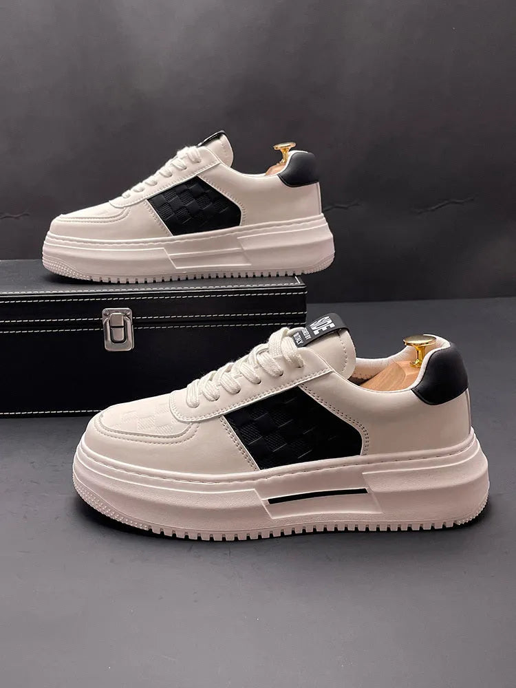 Unisex white sports casual shoes with cloth upper and rubber foam sole in black or green accent colours