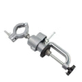 Clamp-on bench vise with a 360-degree rotating bracket and tungsten steel construction on a workbench.