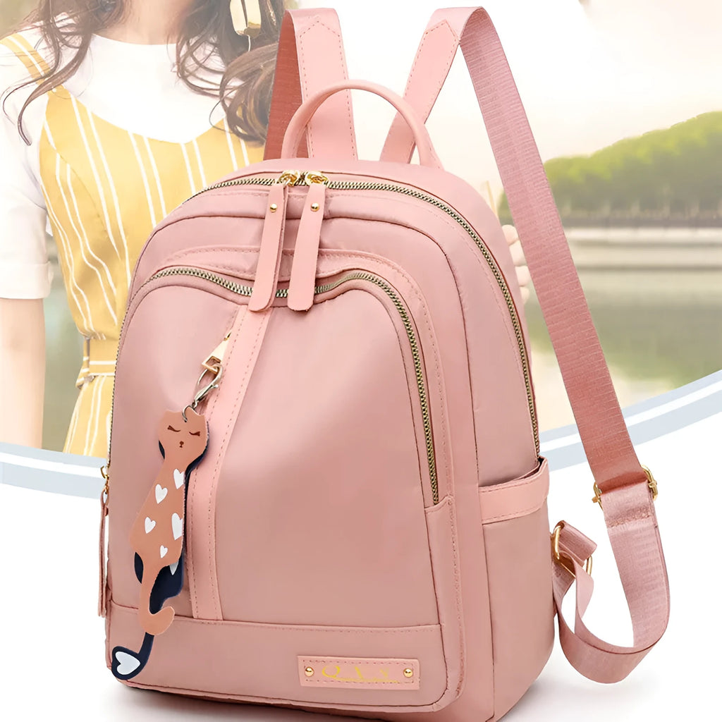 Black nylon women's casual backpack with internal pockets and double shoulder straps.