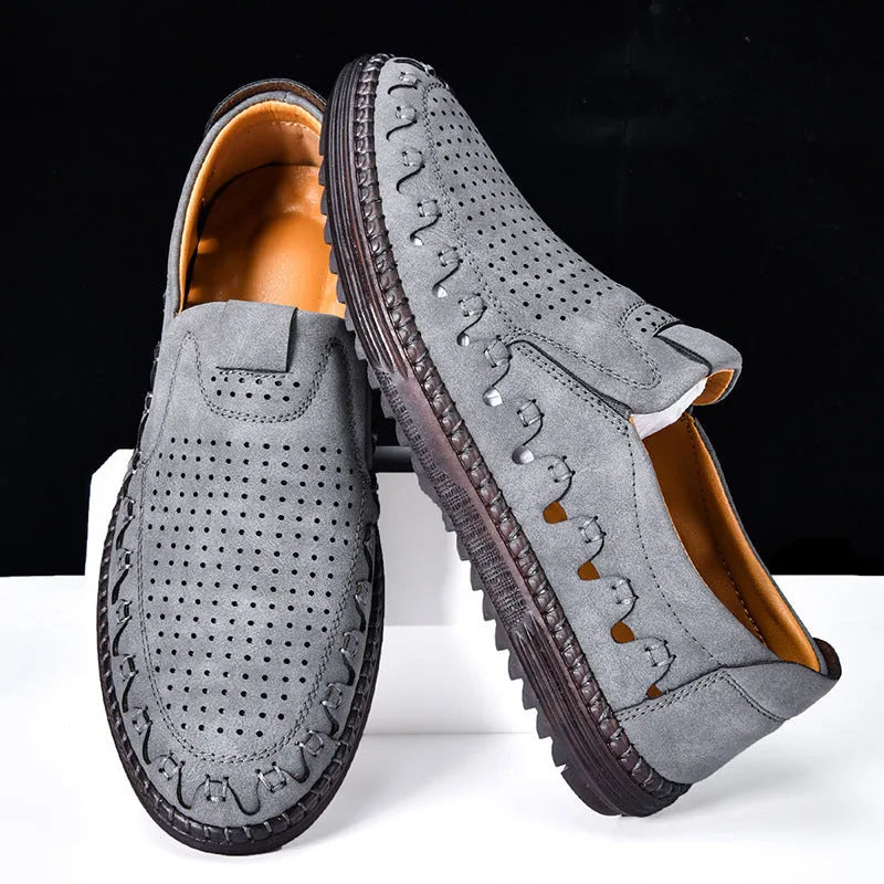 Men's brown casual slip-on shoes with round toe and low-top design showing sewing line details on PVC sole