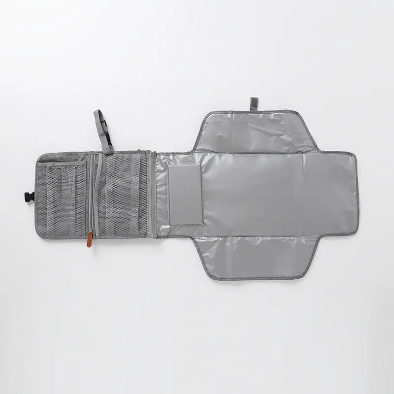 Waterproof grey polyester changing table pad for urinal and incontinence care, one size