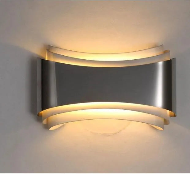 Simple modern warm white LED wall lamp with matte finish and compact rectangular design.