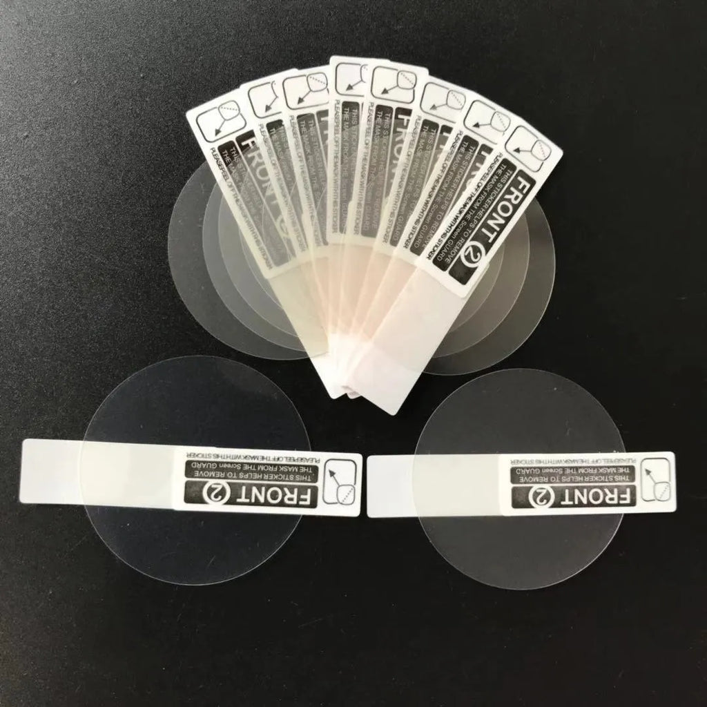 Three transparent tempered glass screen protector films for Ticwatch2 smartwatch on a white background.