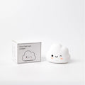 White cloud silicone rechargeable pat lamp bedside ambience light on nightstand with soft glow