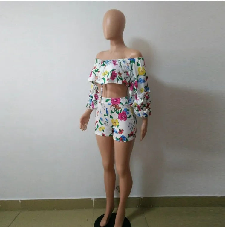 Women's multicolour digital print pyjama set with a short top featuring fluffy long sleeves and matching shorts.