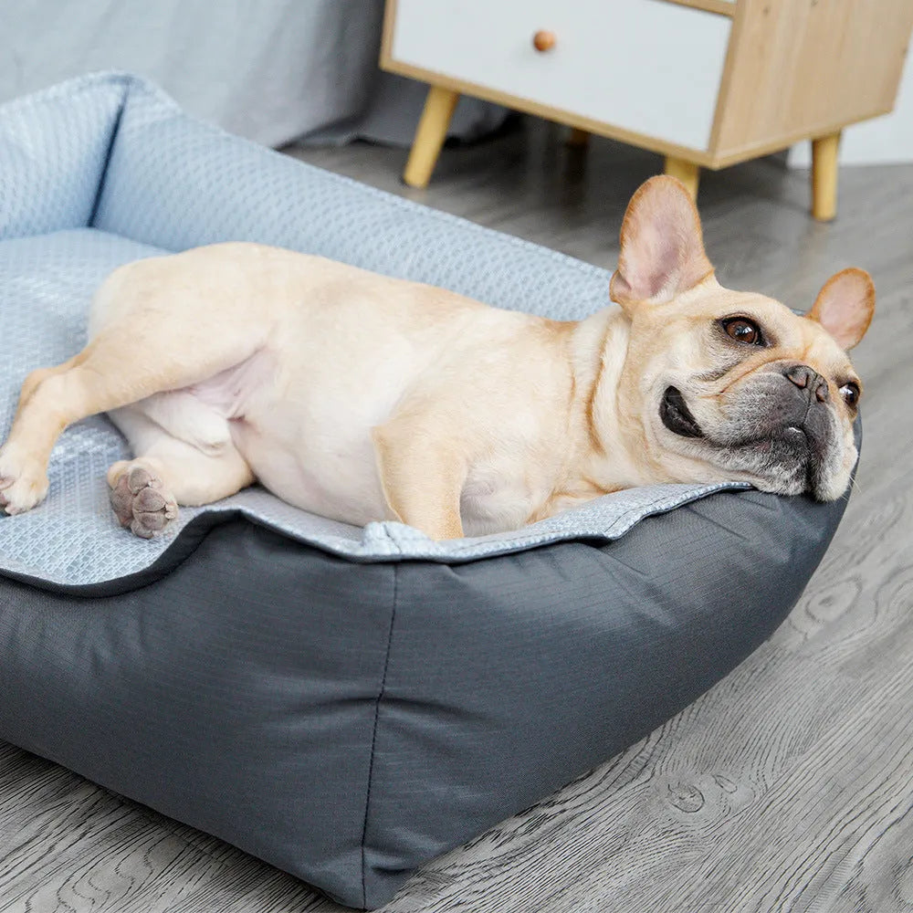 Soft grey pet bed with removable cover in small, medium, and large sizes for dogs and cats.