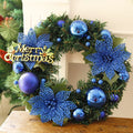 30cm multicolour plastic Christmas wreath with bendable branches on a red door.