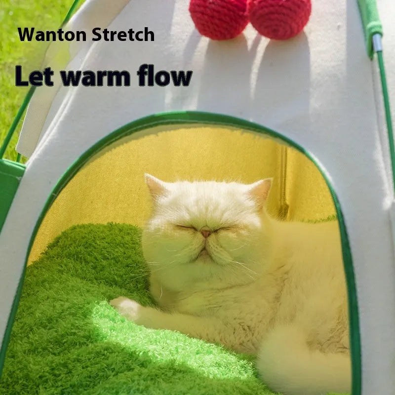 Beige dome-shaped cloth cat tent with a thick padded mat inside, shown on a wooden floor.