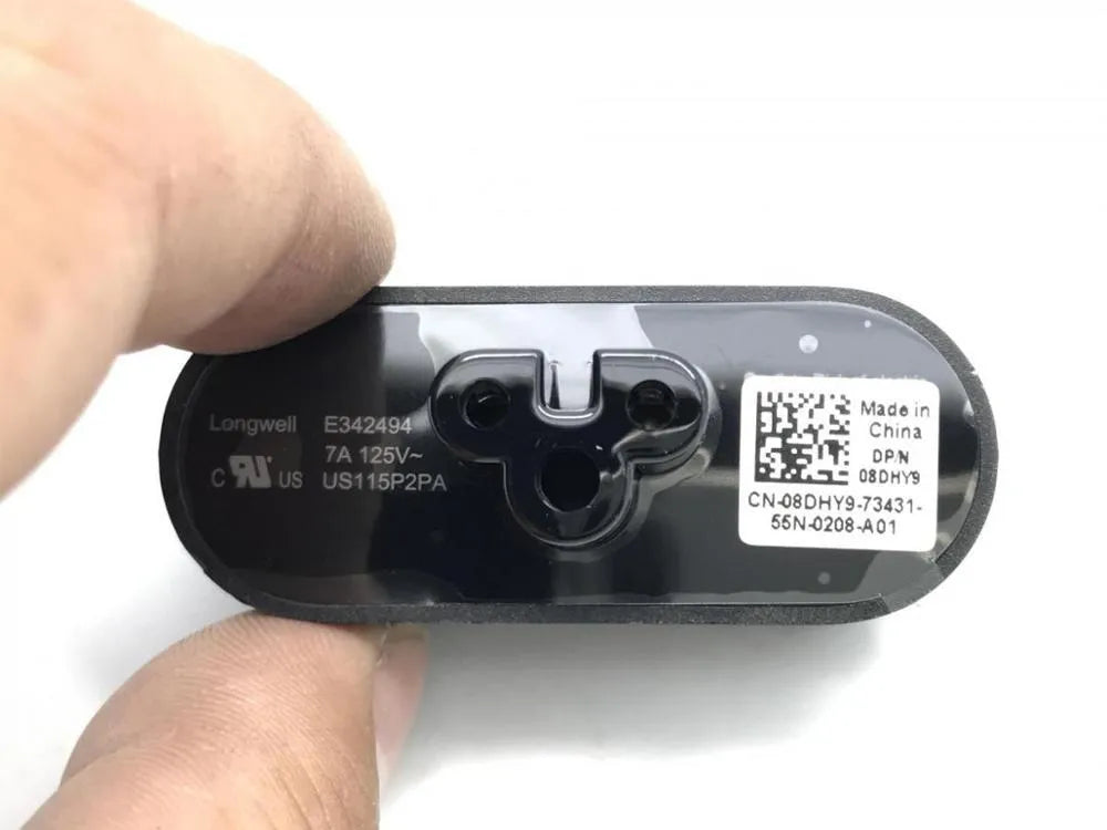 Black folding US plug for laptop chargers showing straight and 90-degree angled positions.