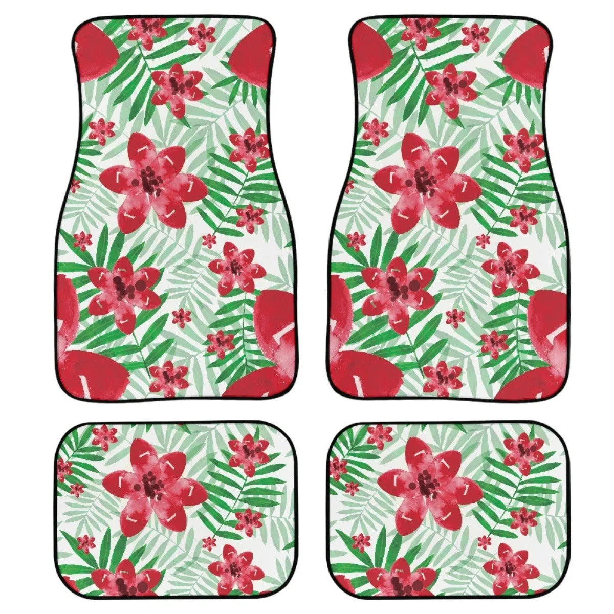 Set of four black printed rubber car floor mats with textured surface, showing thickness.