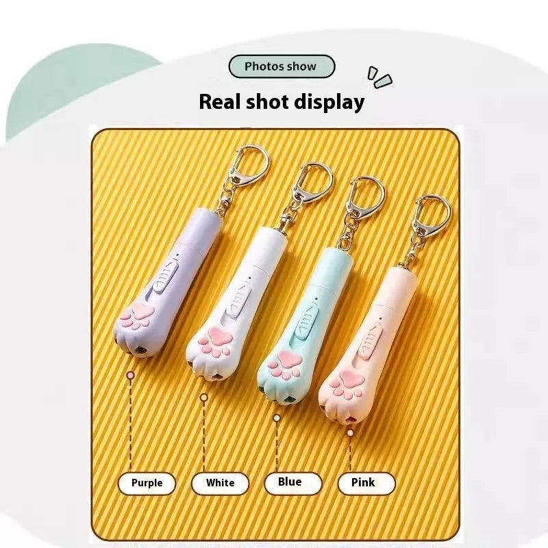 Pink plastic cat teaser pen with a light-up end for interactive play.